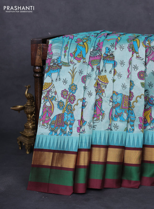 Silk cotton saree teal blue and deep maroon with allover kalamkari prints and temple design zari woven simple border