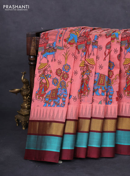 Silk cotton saree peach shade and deep maroon with allover floral prints and temple design zari woven simple border