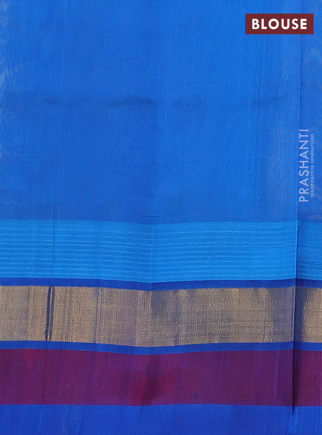 Silk cotton saree pale yellow and cs blue with allover kalamkari prints and temple design zari woven simple border