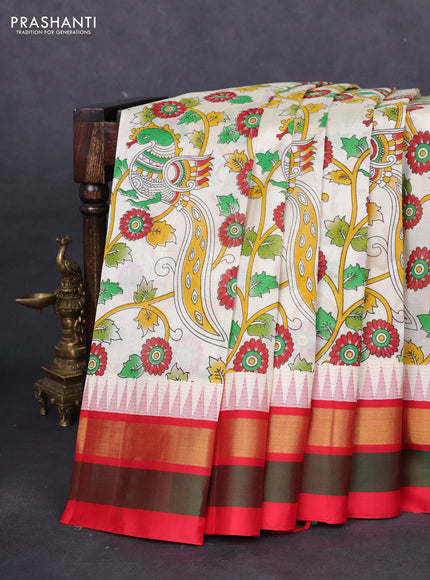 Silk cotton saree cream and red with allover kalamkari prints and temple design zari woven border
