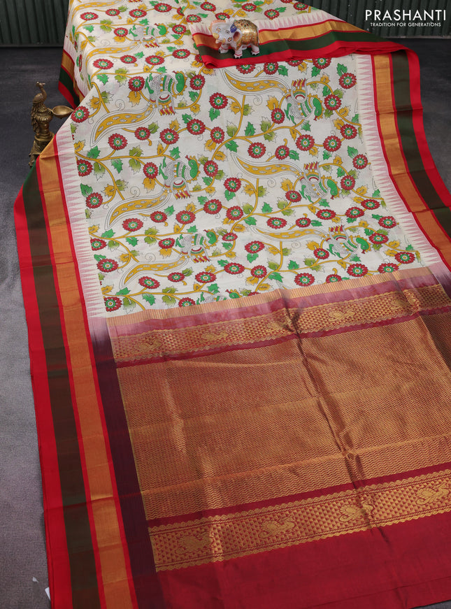 Silk cotton saree cream and red with allover kalamkari prints and temple design zari woven border