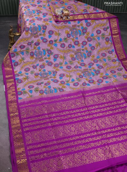 Silk cotton saree mild lavender and purple with allover kalamkari prints and zari woven korvai border