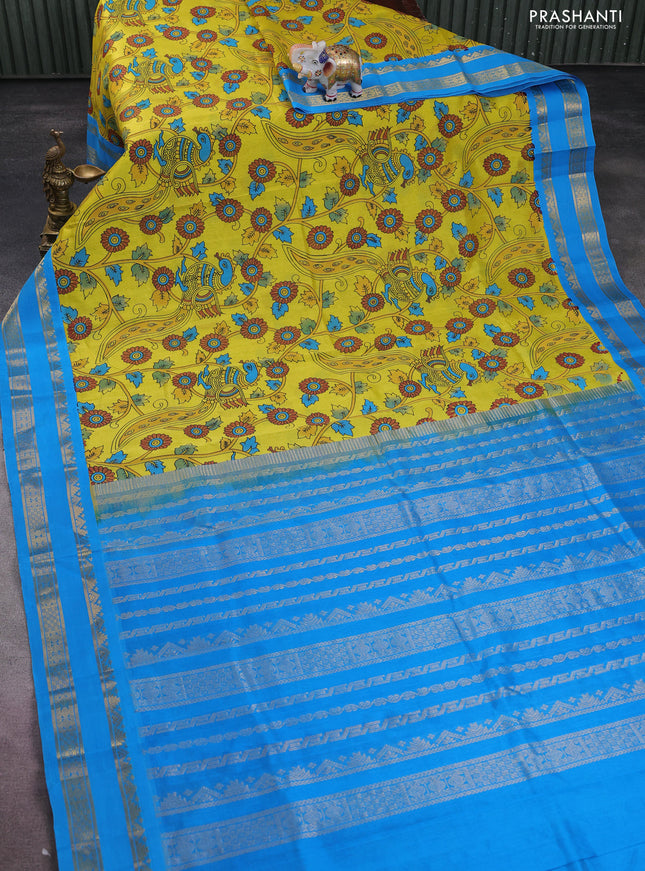 Silk cotton saree yellow and cs blue with allover kalamkari prints and rettapet zari woven korvai border