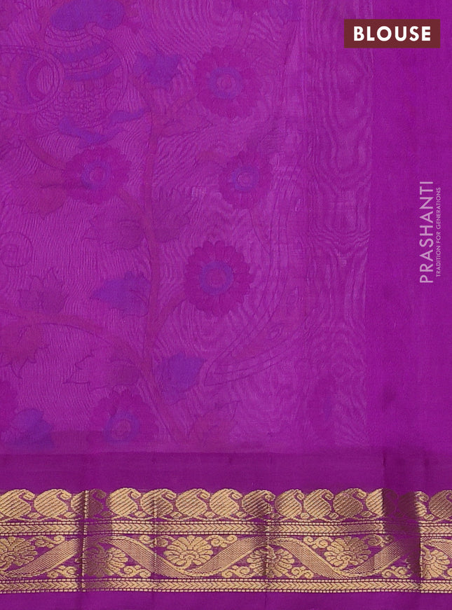 Silk cotton saree mild lavender and purple with allover kalamkari prints and zari woven korvai border