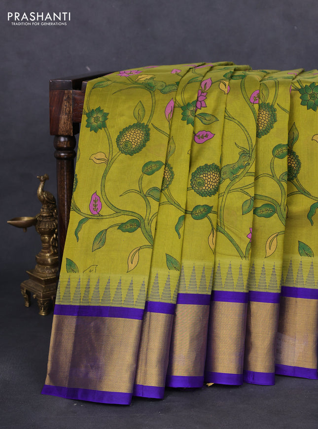 Silk cotton saree mehendi green and blue with allover kalamkari prints and temple design zari woven border