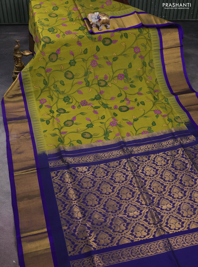 Silk cotton saree mehendi green and blue with allover kalamkari prints and temple design zari woven border