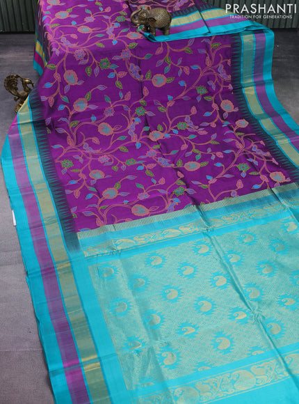 Silk cotton saree purple and teal blue with allover kalamkari prints and temple design zari woven border