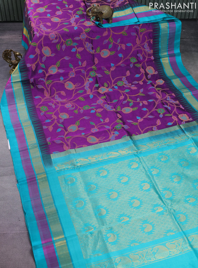 Silk cotton saree purple and teal blue with allover kalamkari prints and temple design zari woven border