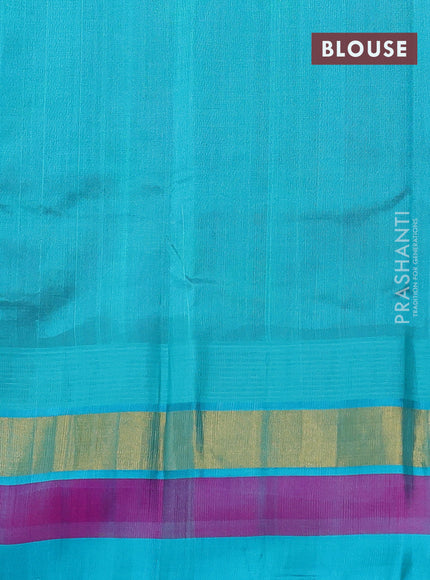 Silk cotton saree purple and teal blue with allover kalamkari prints and temple design zari woven border