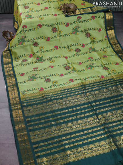 Silk cotton saree pastel green and dark green with allover madhubani prints and zari woven korvai border