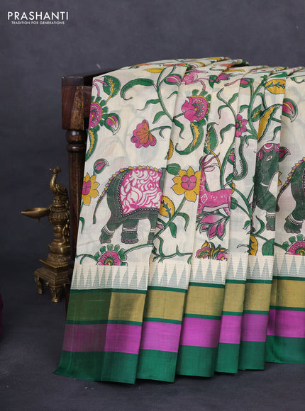 Silk cotton saree cream and green with allover kalamkari prints and temple design zari woven simple border