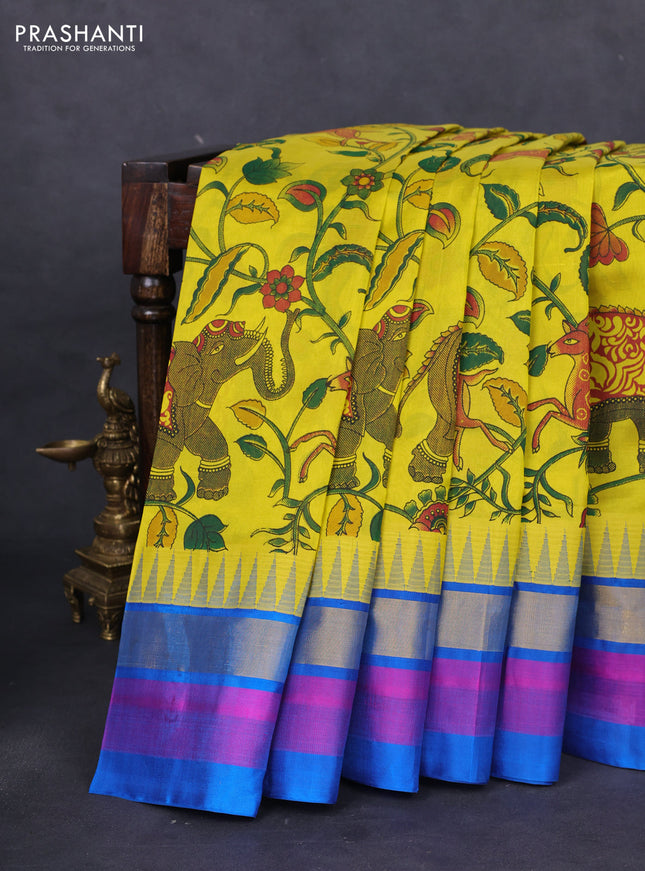 Silk cotton saree lime yellow and cs blue with allover kalamkari prints and temple design zari woven simple border