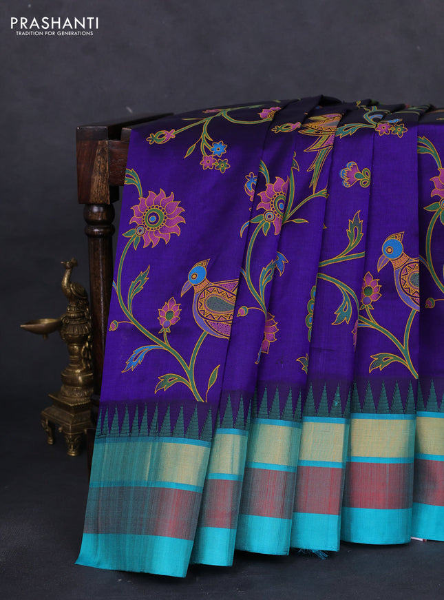 Silk cotton saree blue and teal green with allover kalamkari prints and temple design zari woven simple border