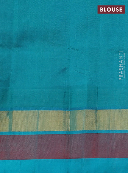 Silk cotton saree blue and teal green with allover kalamkari prints and temple design zari woven simple border