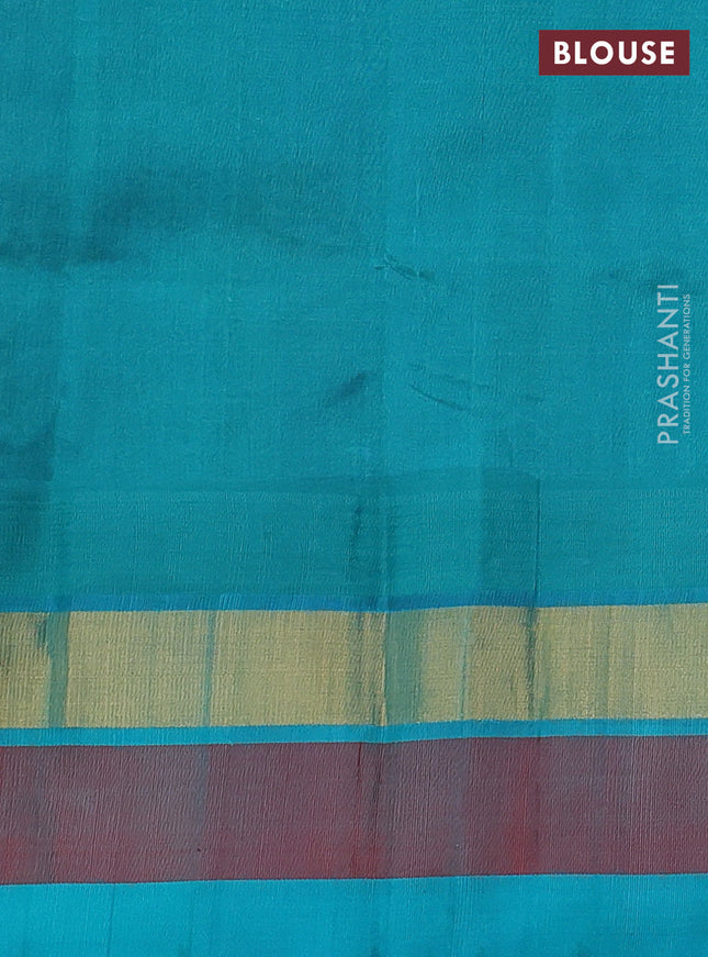Silk cotton saree blue and teal green with allover kalamkari prints and temple design zari woven simple border