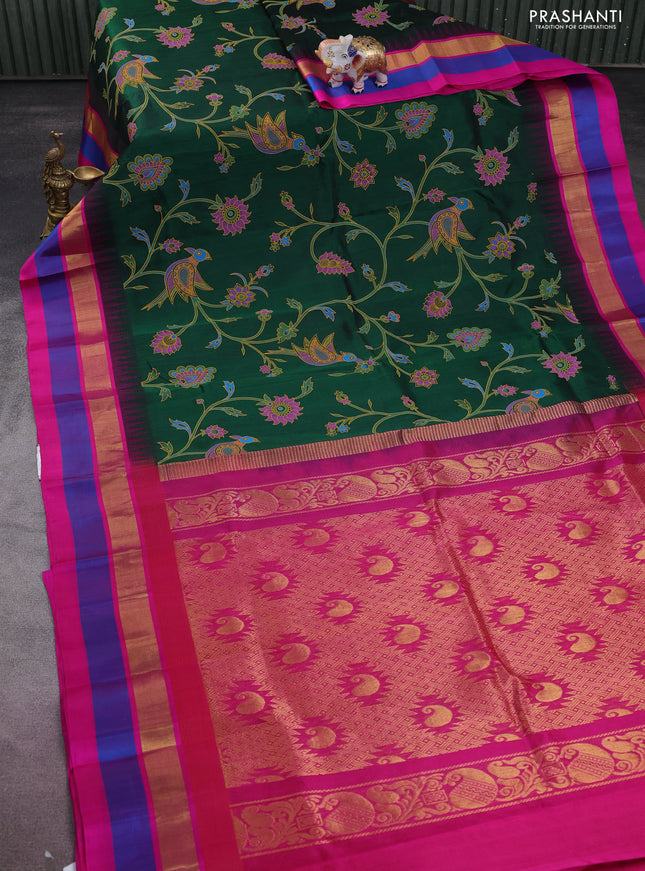 Silk cotton saree bottle green and pink with allover kalamkari prints and temple design zari woven simple border