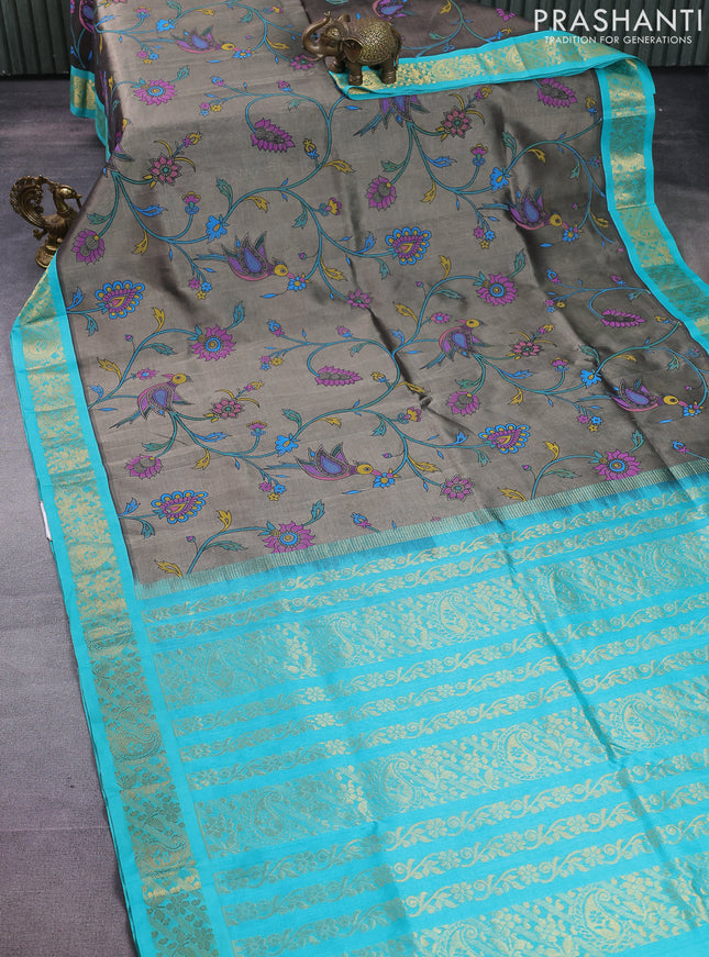Silk cotton saree grey and teal blue with allover kalamkari prints and zari woven korvai border