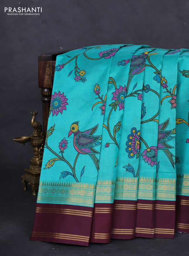 Silk cotton saree teal blue and deep maroon with allover kalamkari prints and rettapet zari woven korvai border
