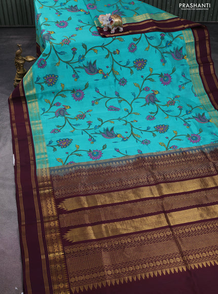 Silk cotton saree teal blue and deep maroon with allover kalamkari prints and rettapet zari woven korvai border
