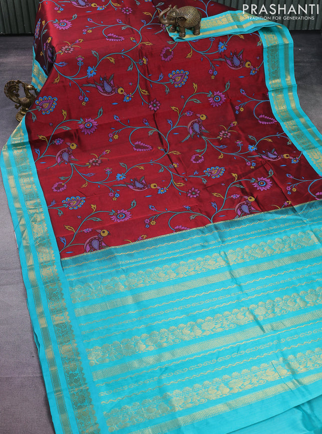Silk cotton saree maroon and teal blue with allover kalamkari prints and rettapet zari woven korvai border