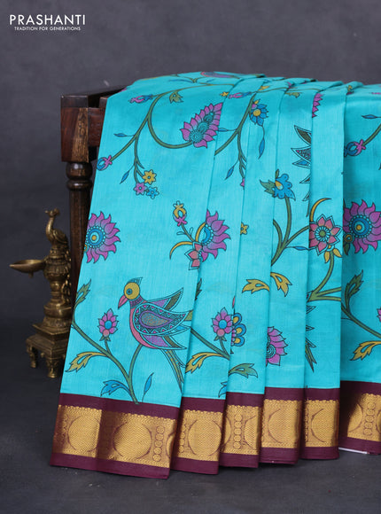 Silk cotton saree teal blue and deep maroon with allover kalamkari prints and zari woven korvai border