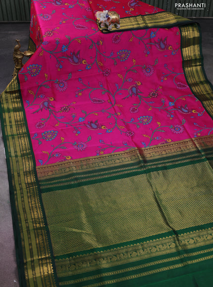 Silk cotton saree pink and bottle green with allover kalamkari prints and zari woven korvai border