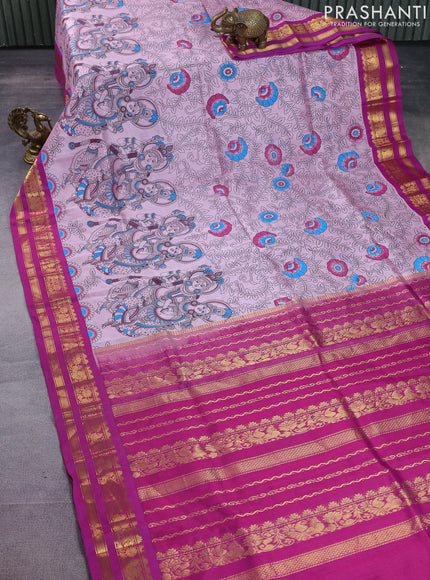 Silk cotton saree mild lavender and purple with allover kalamkari prints and zari woven korvai border