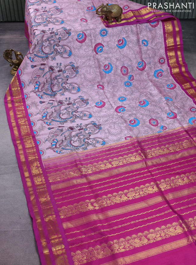 Silk cotton saree mild lavender and purple with allover kalamkari prints and zari woven korvai border