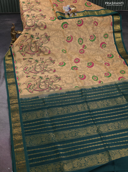 Silk cotton saree pale orange and green with allover kalamkari prints and zari woven korvai border