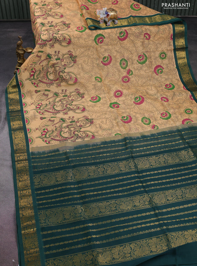 Silk cotton saree pale orange and green with allover kalamkari prints and zari woven korvai border