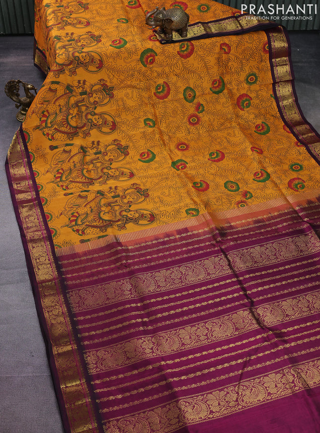 Silk cotton saree mustard yellow and dark magenta pink with allover kalamkari prints and zari woven korvai border