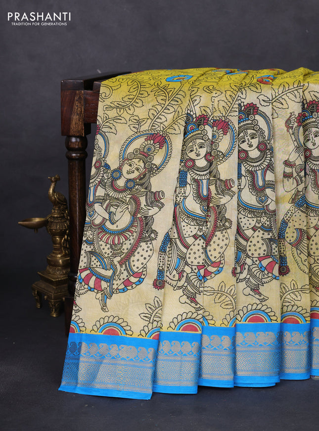 Silk cotton saree pale yellow and cs blue with allover kalamkari prints and zari woven korvai border