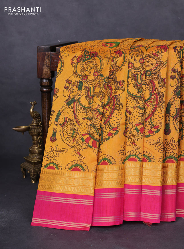 Silk cotton saree mango yelllow and pink with allover kalamkari prints and rettapet zari woven border
