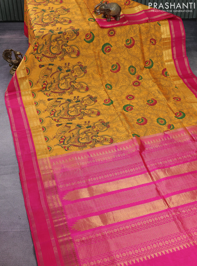 Silk cotton saree mango yelllow and pink with allover kalamkari prints and rettapet zari woven border