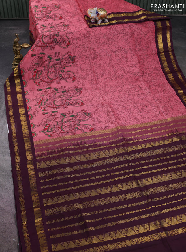 Silk cotton saree peach shade and deep maroon with allover kalamkari prints and rettapet zari woven border