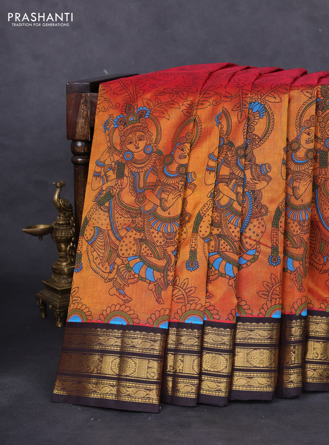 Silk cotton saree dual shade of dark mustard and coffee brown with allover kalamkari prints and zari woven korvai border