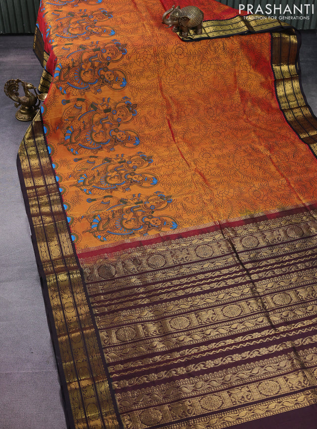 Silk cotton saree dual shade of dark mustard and coffee brown with allover kalamkari prints and zari woven korvai border