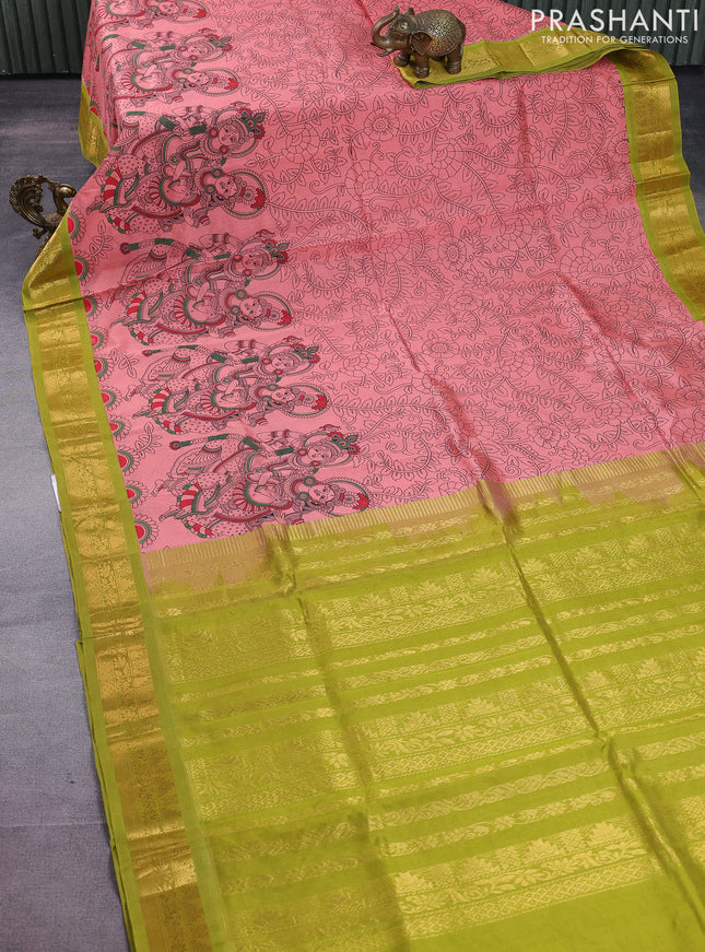 Silk cotton saree peach shade and mehendi green with allover kalamkari prints and zari woven korvai border
