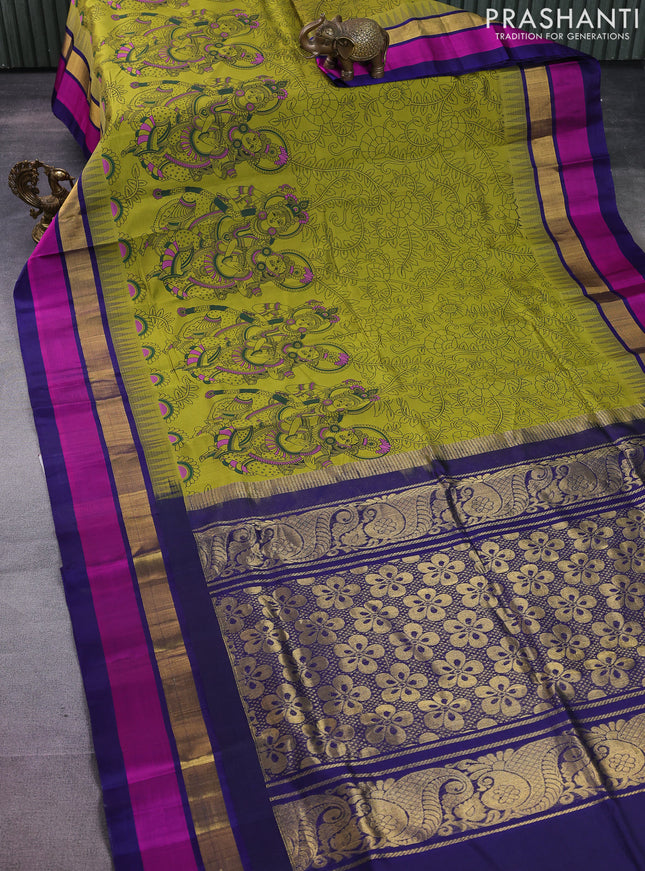 Silk cotton saree mehendi green and blue with allover kalamkari prints and temple design zari woven simple border