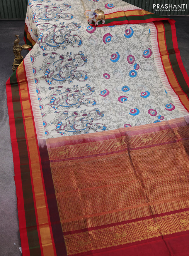 Silk cotton saree cream and maroon with allover kalamkari prints and temple design zari woven simple border