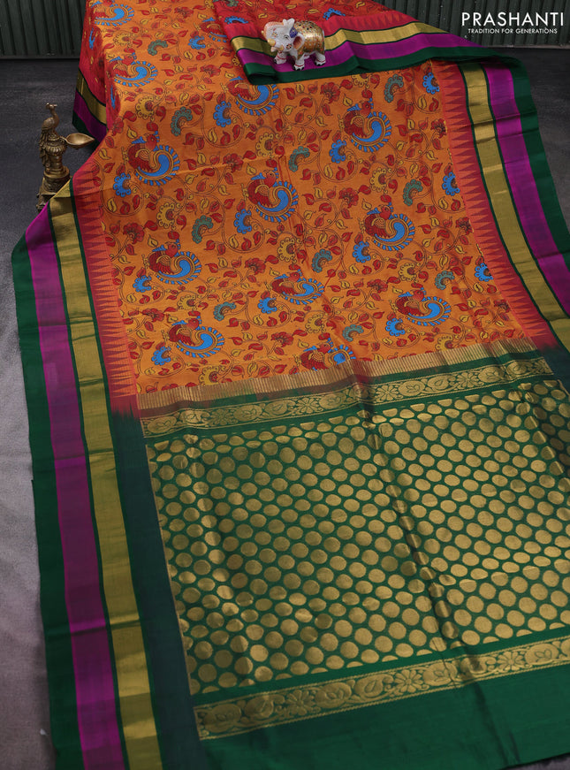 Silk cotton saree dual shade of dark mustard and green with allover kalamkari prints and temple design zari woven simple border