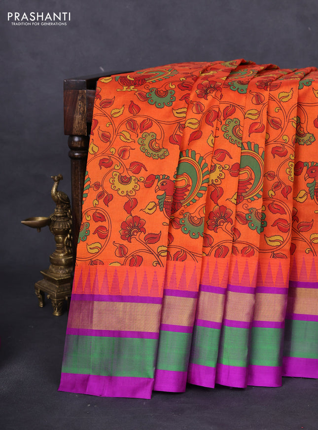 Silk cotton saree orange and purple with allover kalamkari prints and temple design zari woven simple border