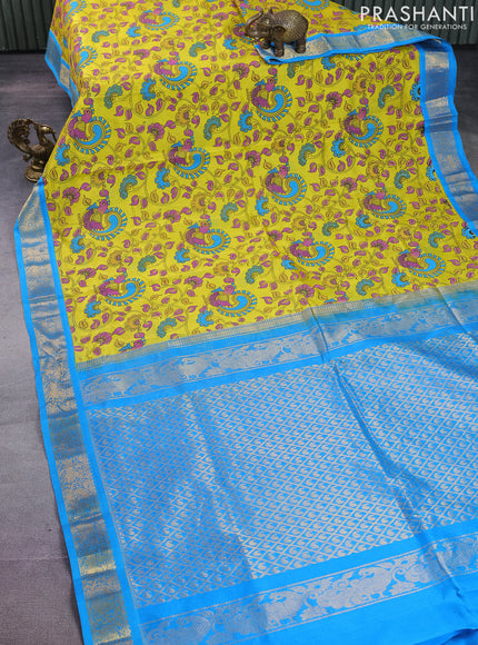 Silk cotton saree yellow and blue with allover kalamkari prints and zari woven korvai border