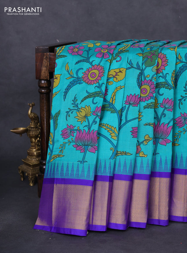Silk cotton saree teal blue and violet with allover kalamkari prints and temple design zari woven simple border
