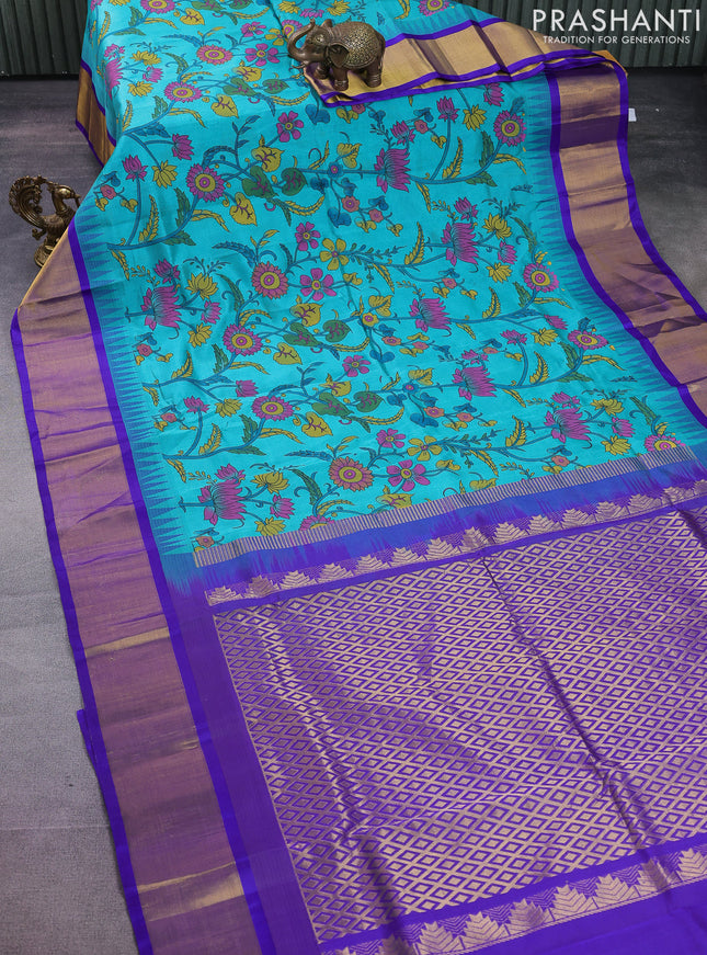 Silk cotton saree teal blue and violet with allover kalamkari prints and temple design zari woven simple border