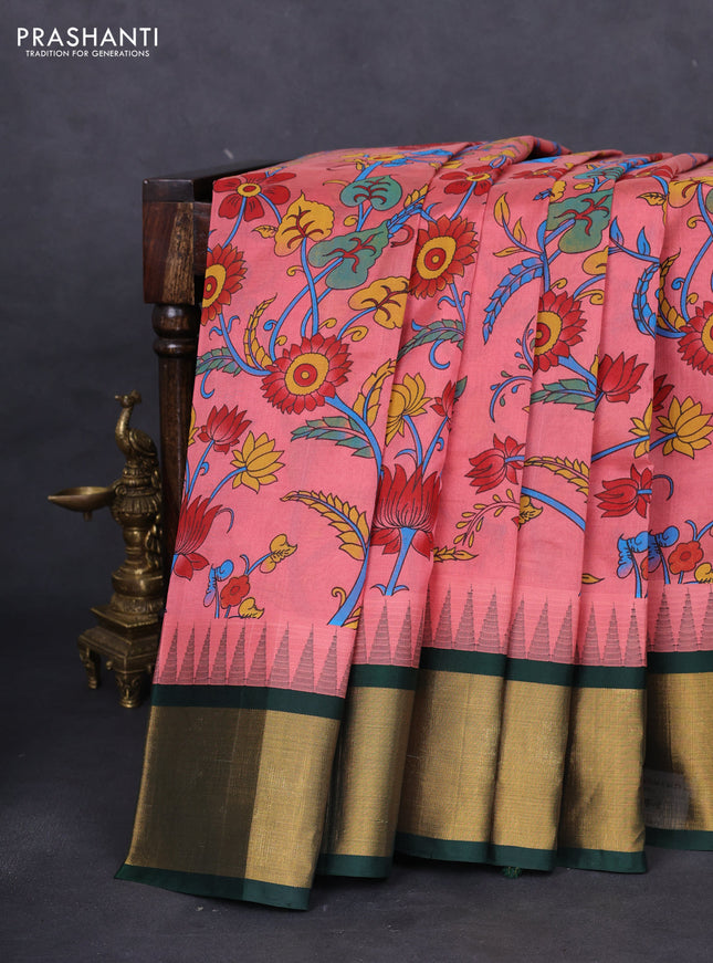 Silk cotton saree peach pink and bottle green with allover kalamkari prints and temple design zari woven simple border