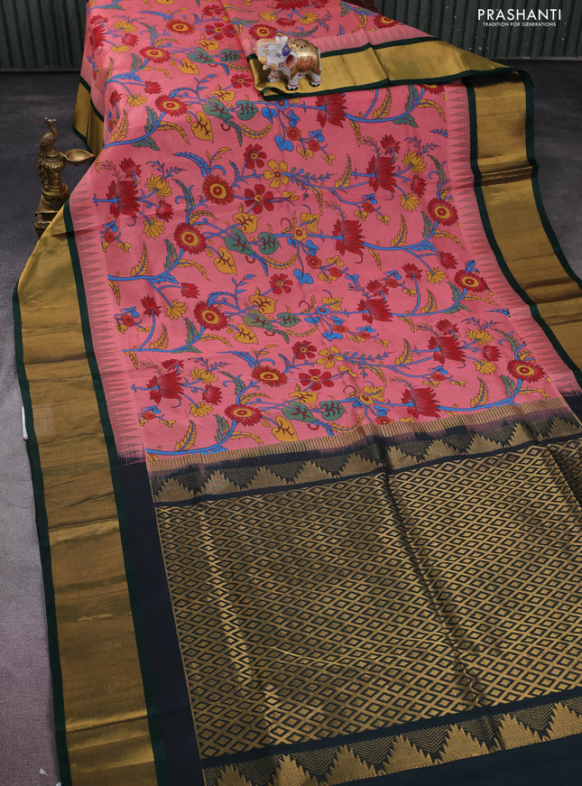 Silk cotton saree peach pink and bottle green with allover kalamkari prints and temple design zari woven simple border