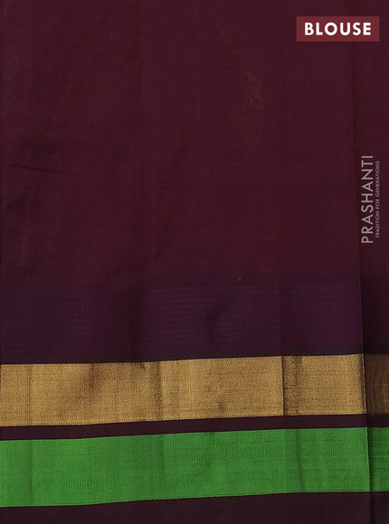 Silk cotton saree teal blue and coffee brown with allover kalamkari prints and temple design zari woven simple border