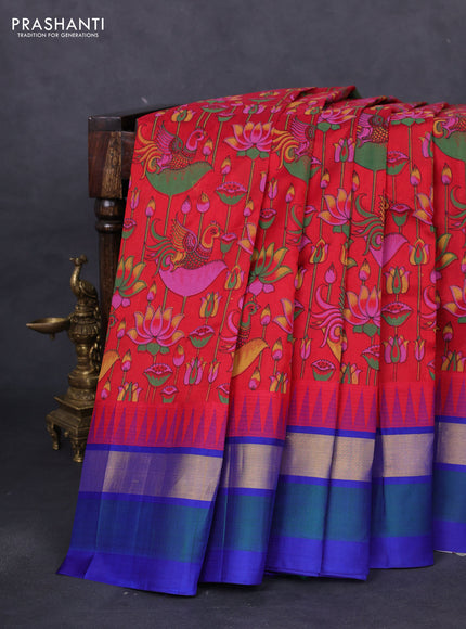 Silk cotton saree red and blue with allover kalamkari prints and temple design zari woven simple border