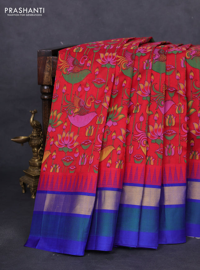 Silk cotton saree red and blue with allover kalamkari prints and temple design zari woven simple border